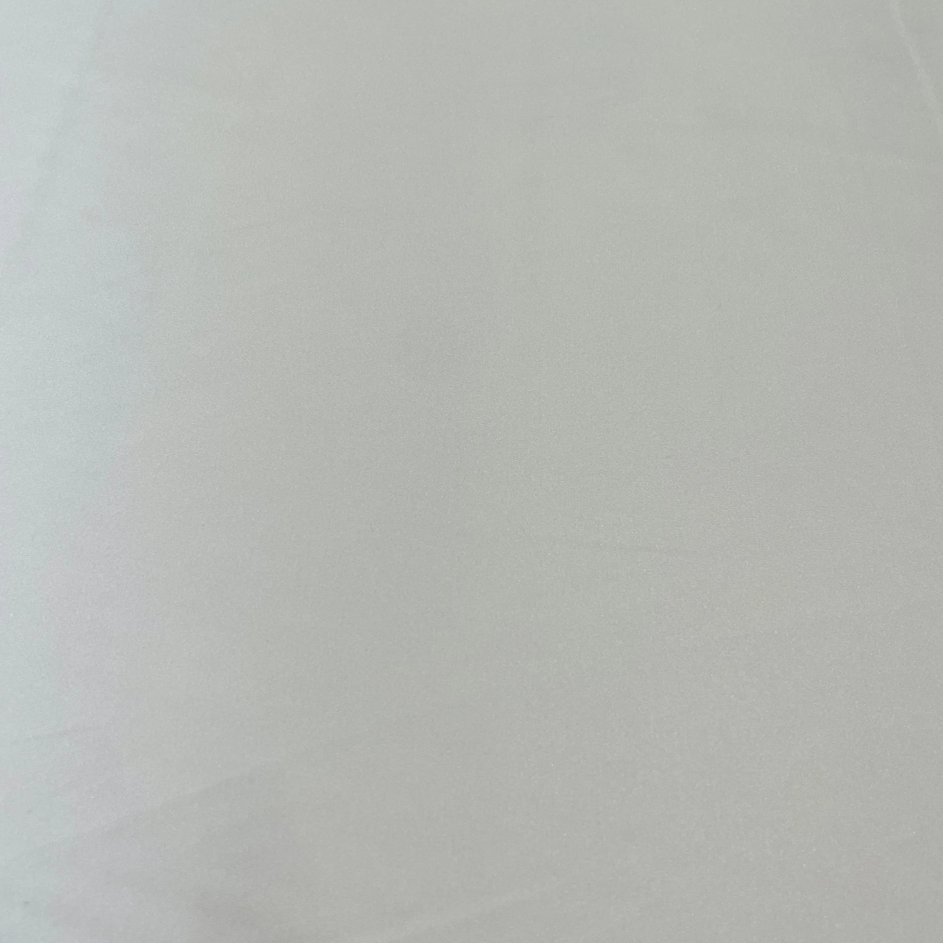Exclusive Peach Pink Solid Celina Satin With Lycra Fabric