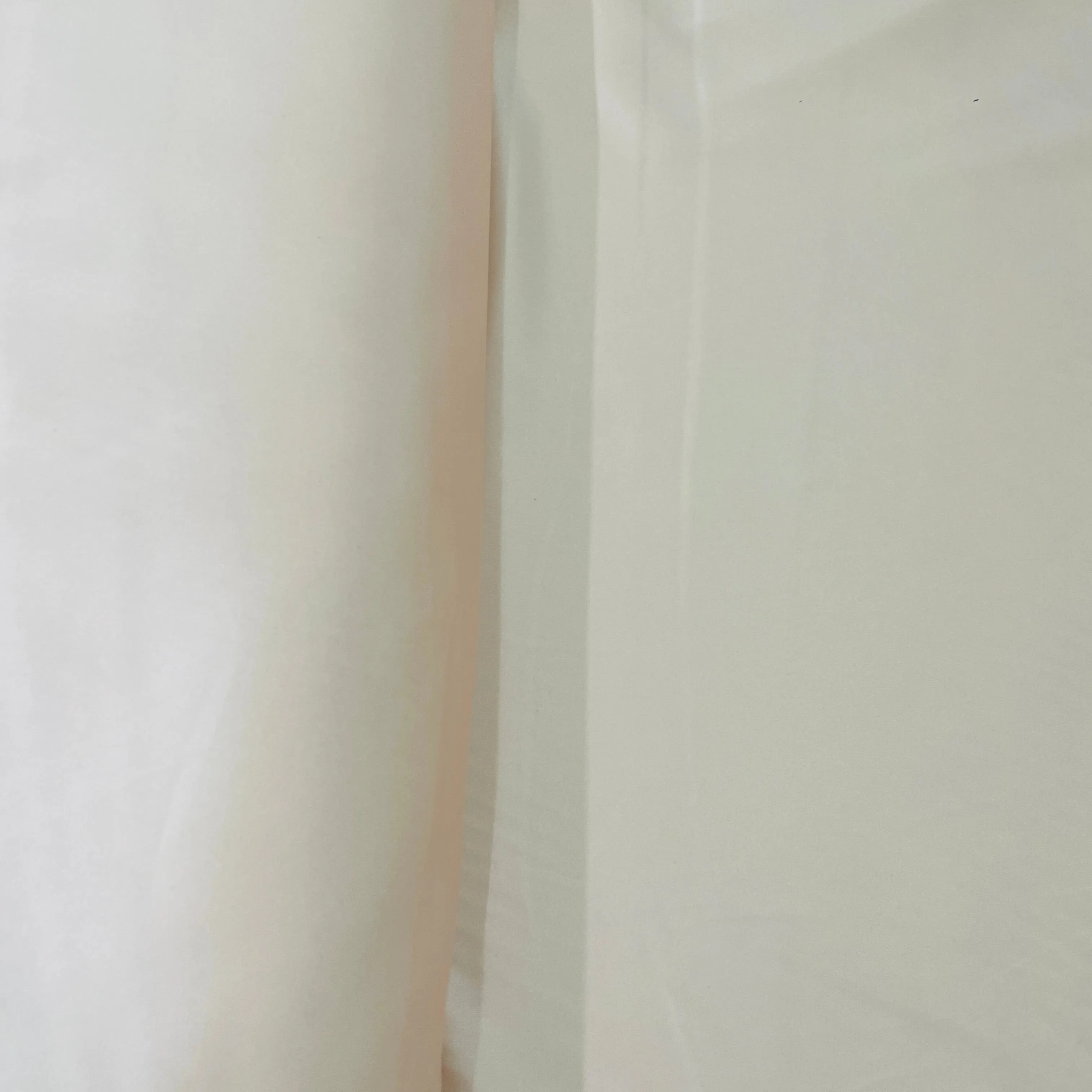 Exclusive Peach Pink Solid Celina Satin With Lycra Fabric